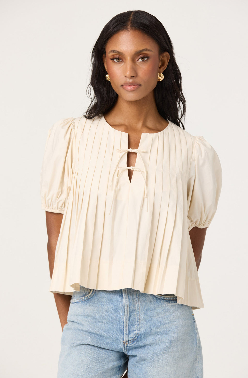 Pleated swing top