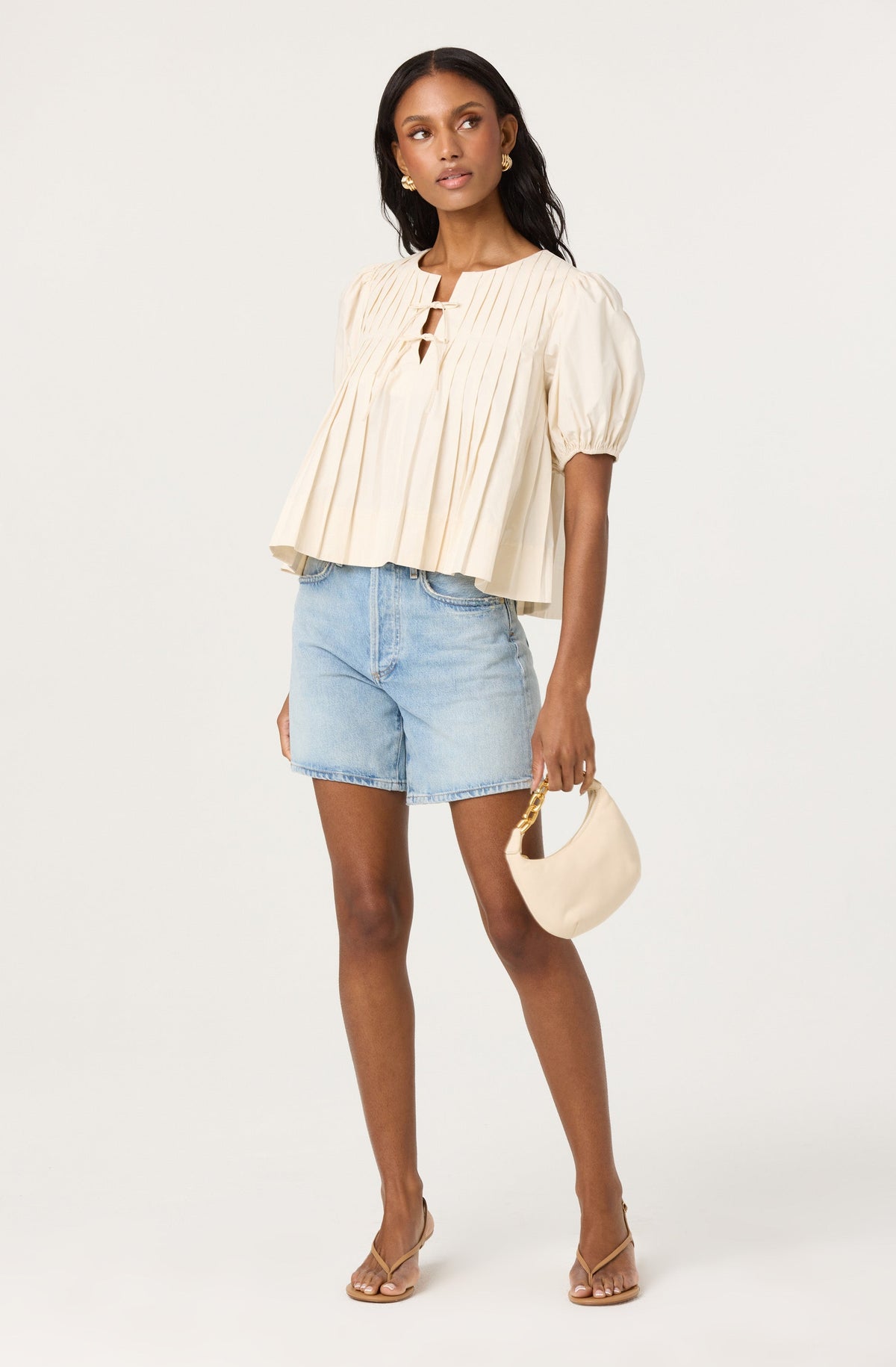 Pleated swing top
